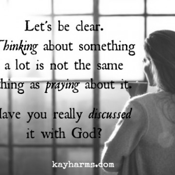 Woman thinking...or praying?